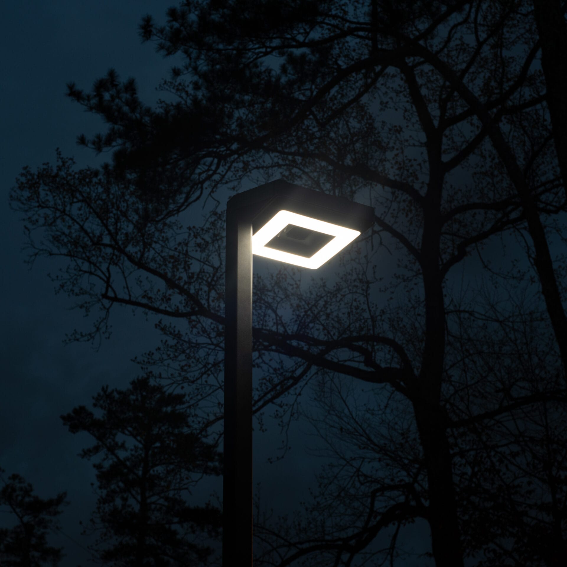 Gama Sonic contemporary solar lamp post illuminating modern walkway