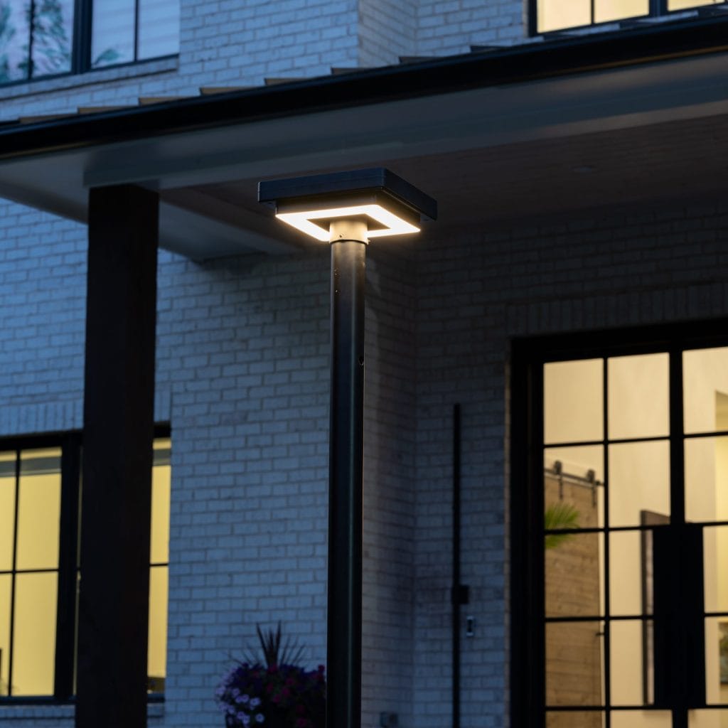 Gama Sonic contemporary solar lamp post illuminating modern walkway