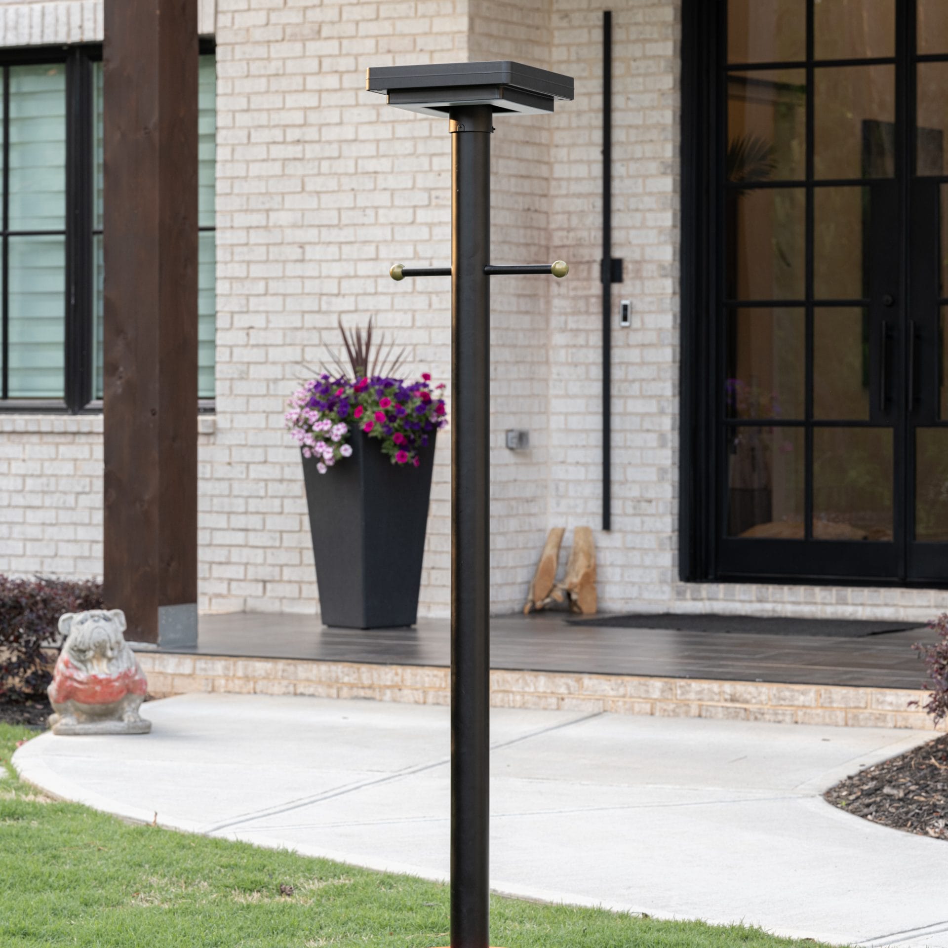 Gama Sonic contemporary solar lamp post illuminating modern walkway