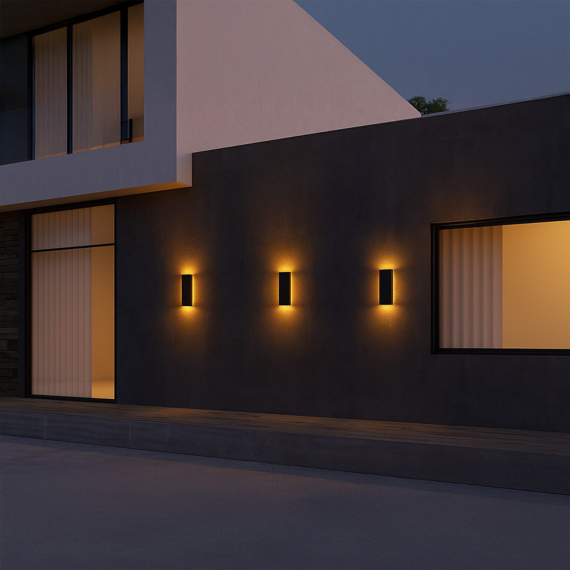 Solar wall light illuminating modern exterior wall with halo backlight
