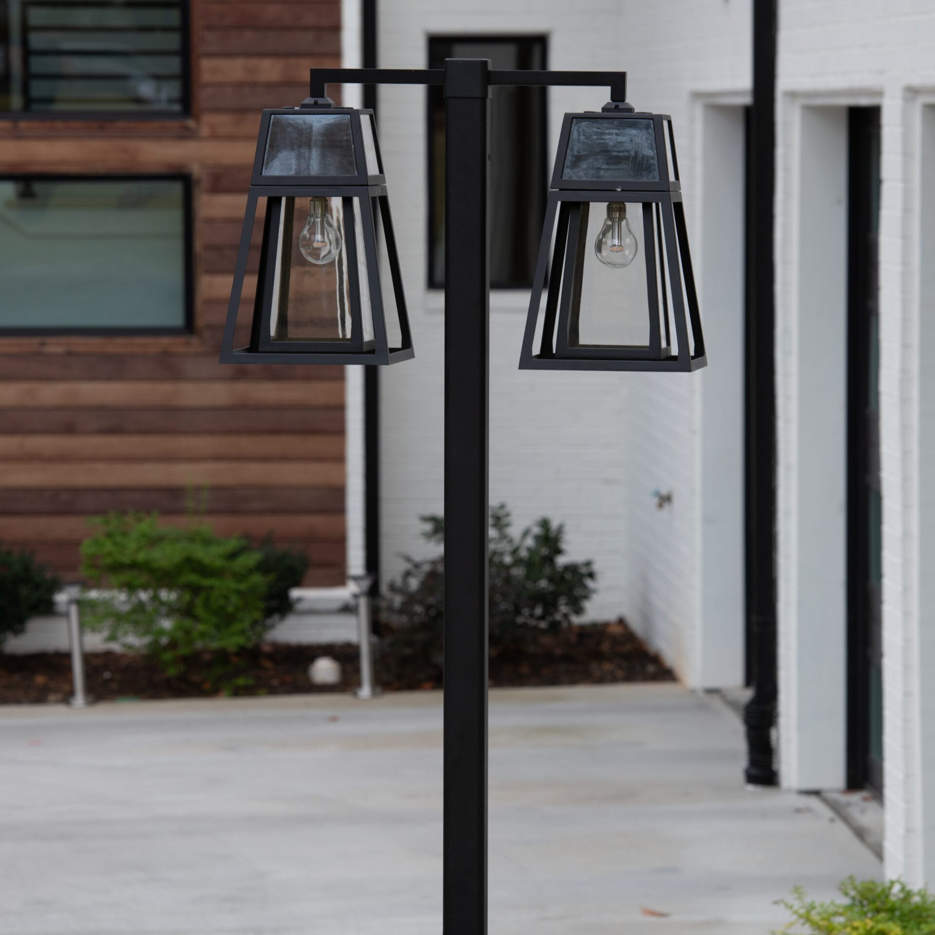 Gama Sonic Aria Dual-Head Solar Post Light illuminating driveway